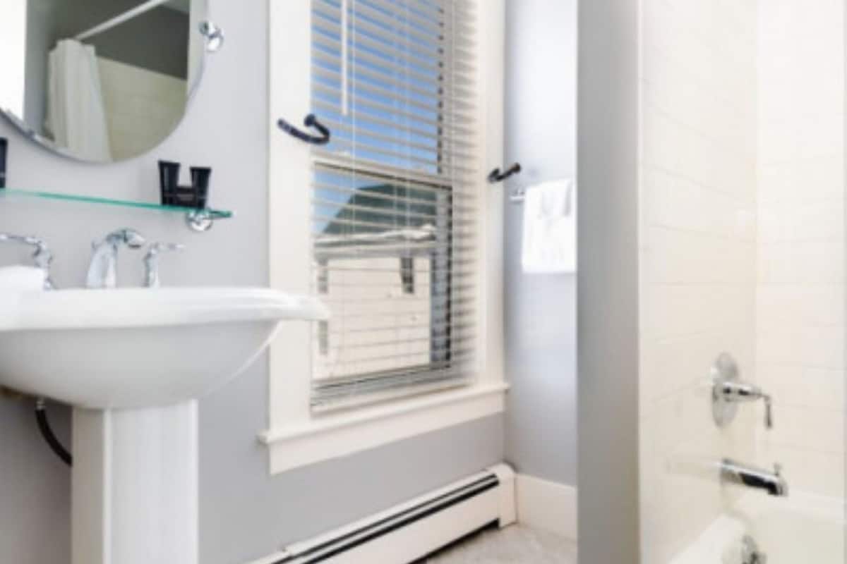 room, 1 queen bed with sofa bed | bathroom | free toiletries, hair dryer, towels, soap