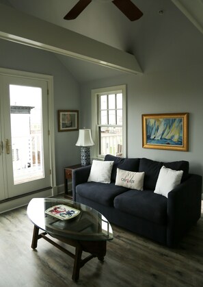 Luxury Suite, 2 Bedrooms, Kitchen, Marina View | Living area - Almondy Inn (Newport)