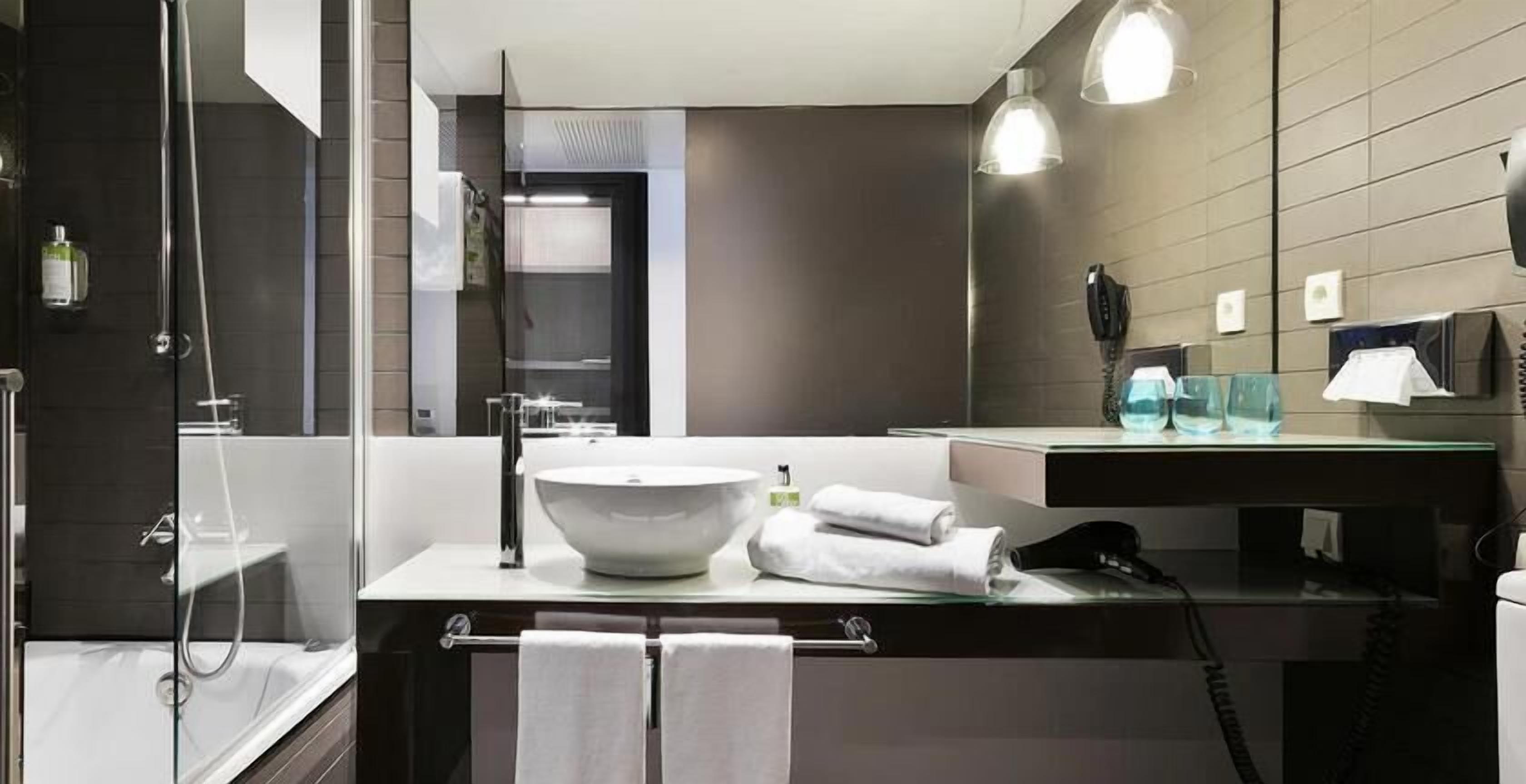 Bathroom | Eco-friendly toiletries, hair dryer, towels, soap