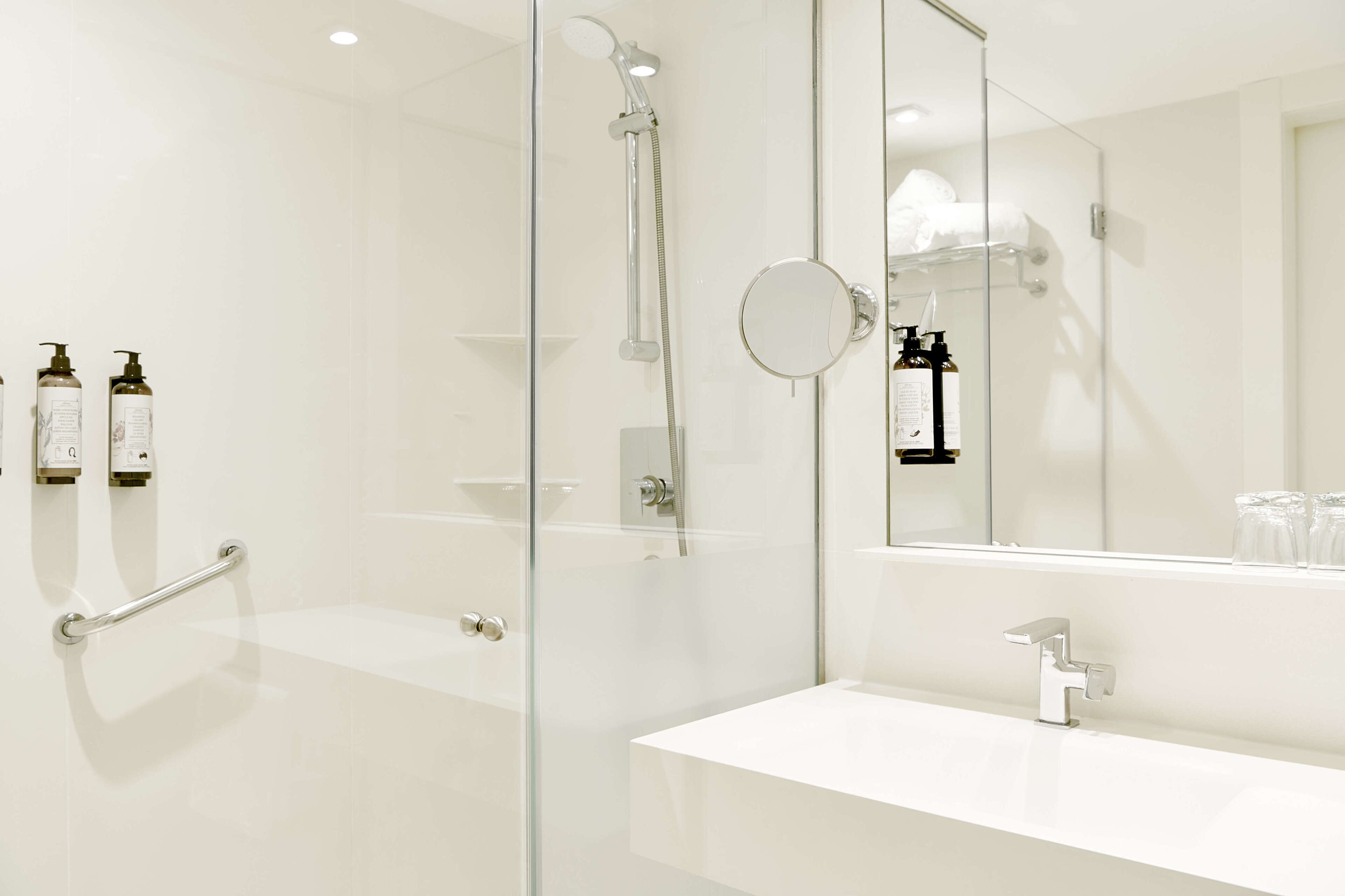 shower, eco-friendly toiletries, hair dryer, towels