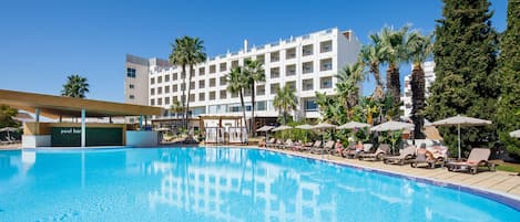 Indoor pool, pool umbrellas, pool loungers
