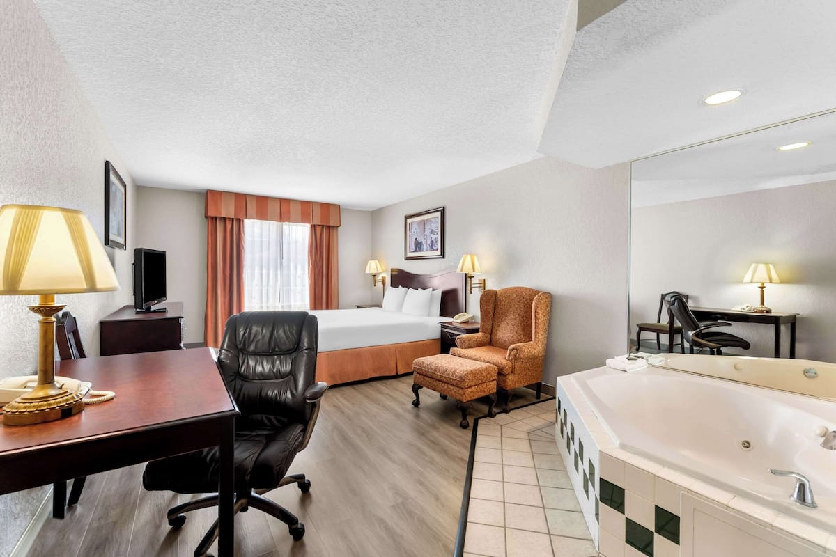 Suite, 1 King Bed, Non Smoking, Jetted Tub | Premium bedding, down comforters, desk, laptop workspace