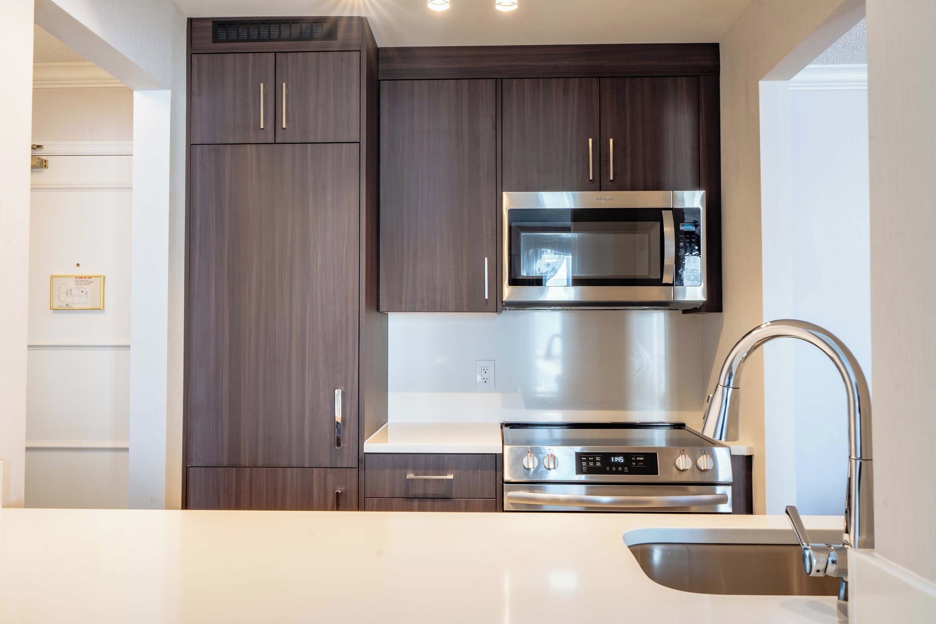 one bedroom premium suite, 1 king bed, sofa bed | private kitchen | fridge, microwave, stovetop, dishwasher