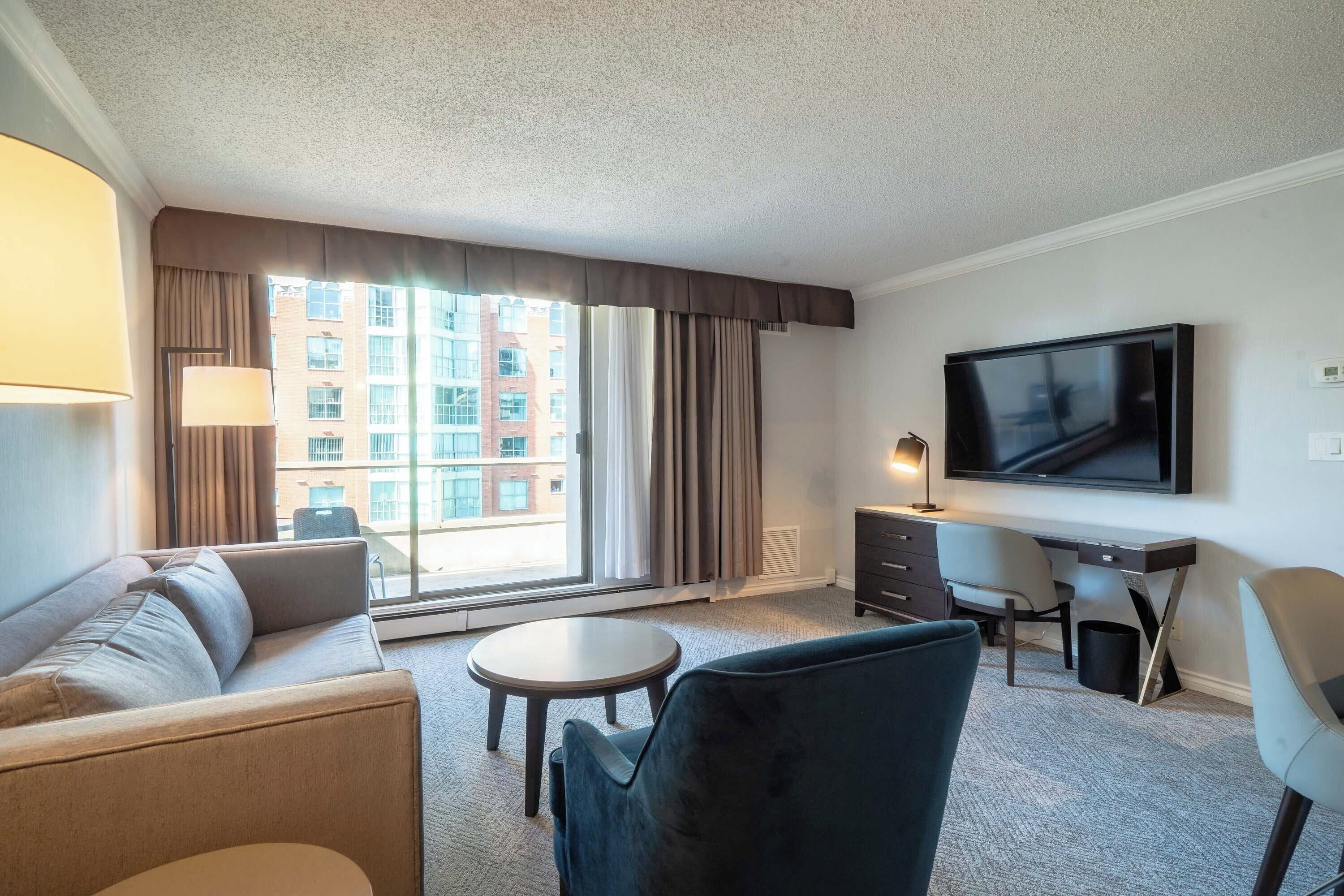 one bedroom premium suite, 1 king bed, sofa bed | 1 bedroom, premium bedding, in-room safe, desk