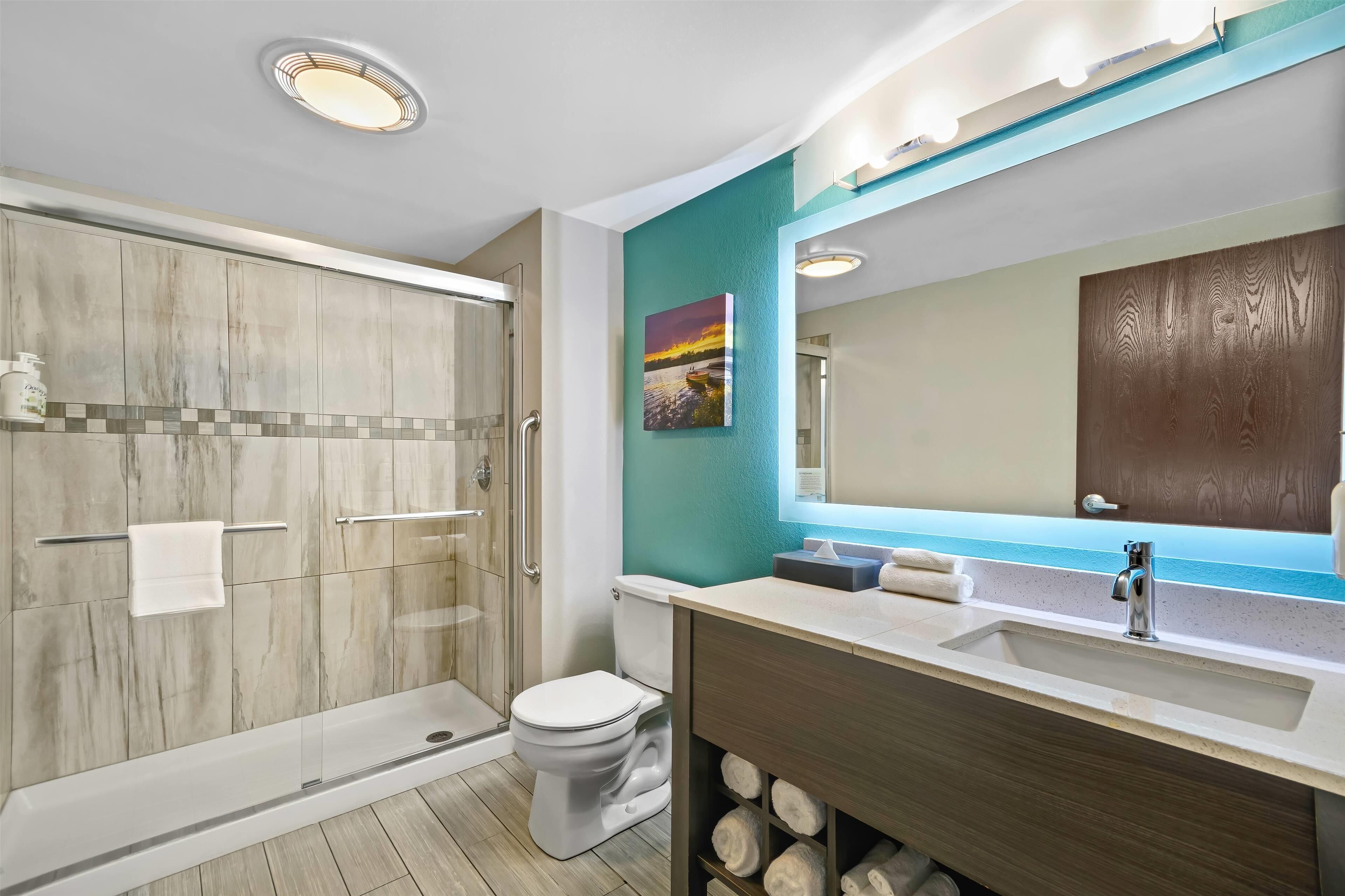 shower, free toiletries, hair dryer, towels