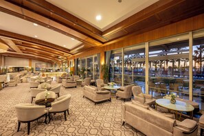 4 bars/lounges, poolside bar, beach bar