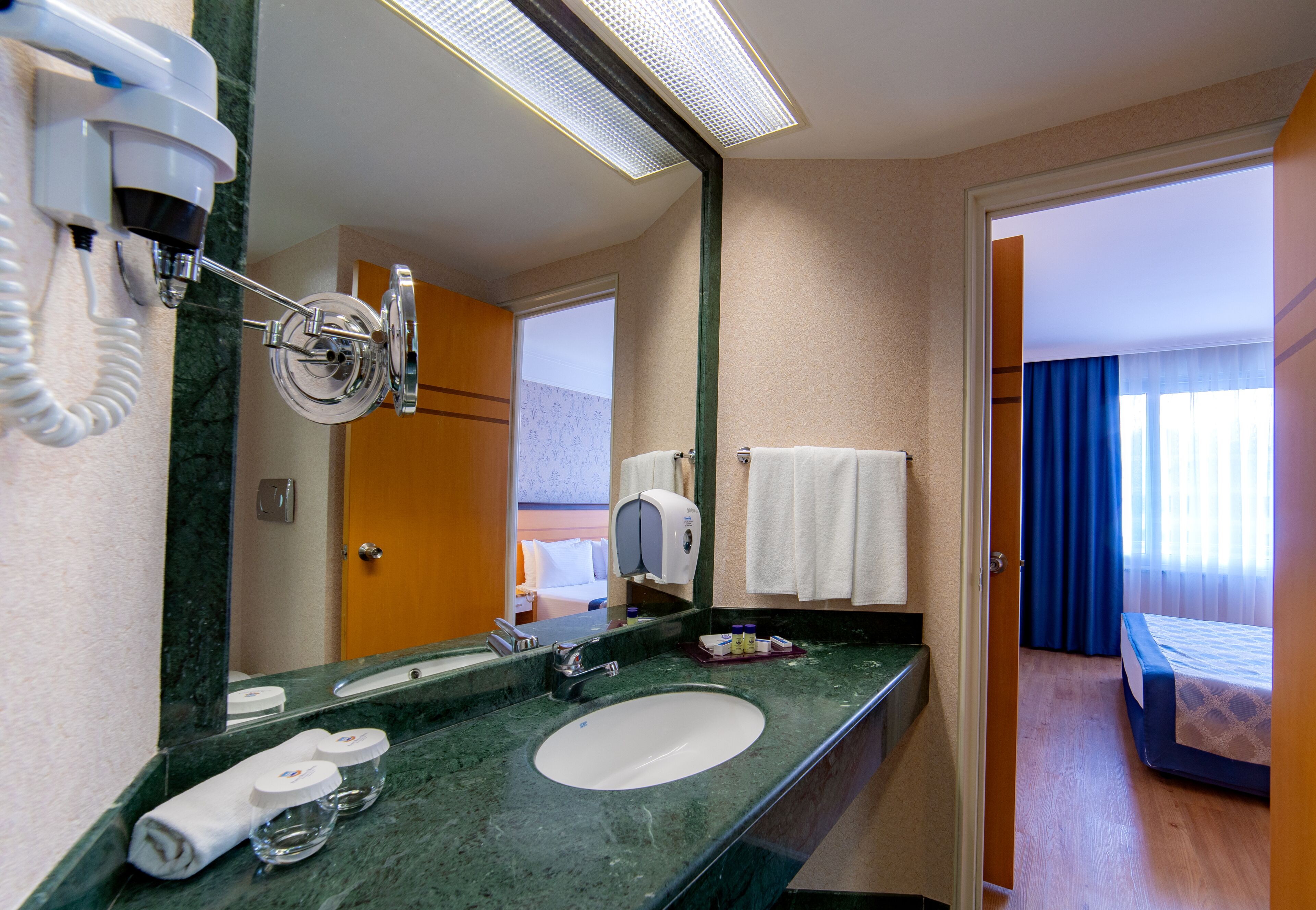 Bathroom | Shower, eco-friendly toiletries, hair dryer, slippers
