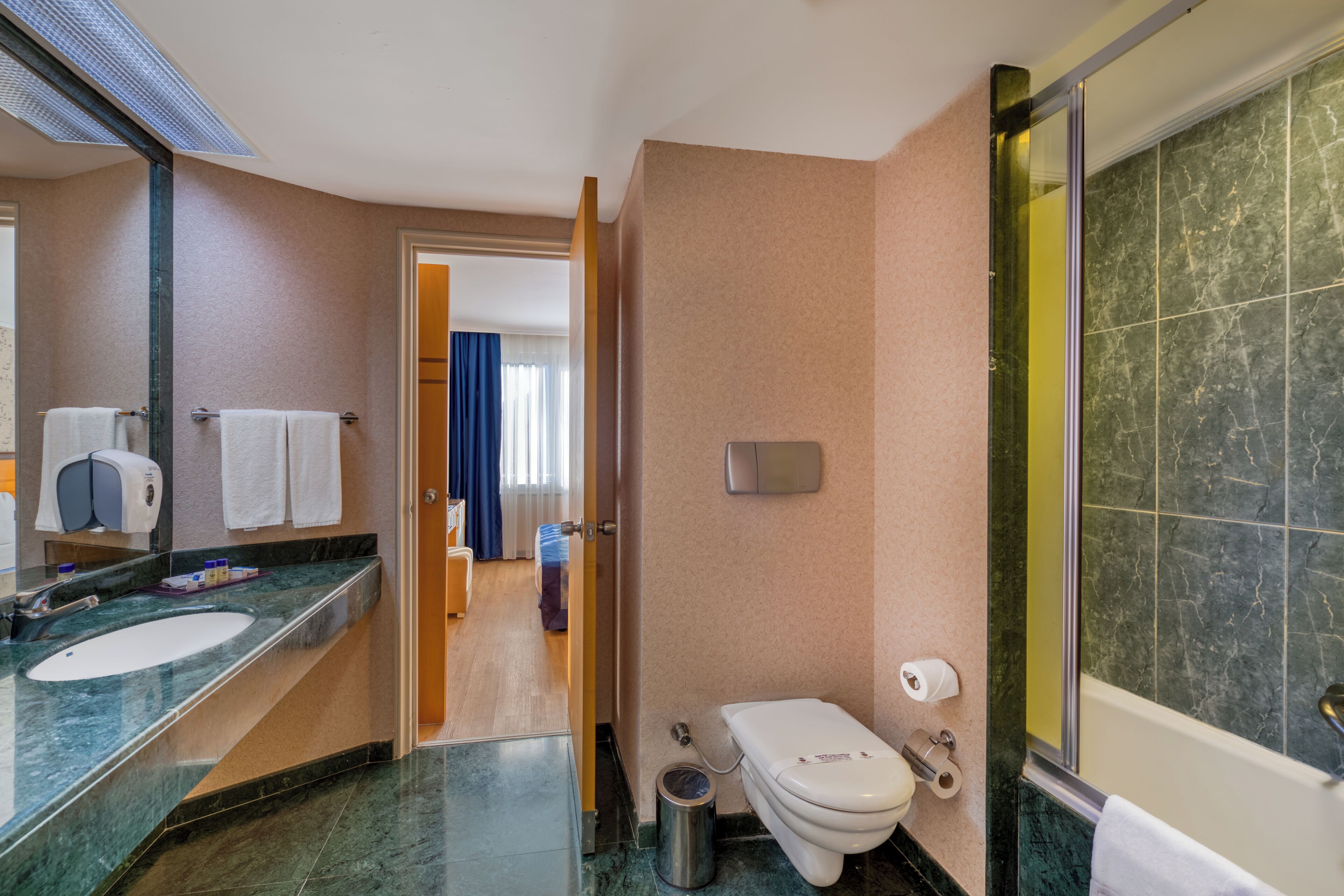 Bathroom | Shower, eco-friendly toiletries, hair dryer, slippers