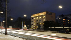 A multi-story building with a sign reading "Ambassaden Parkhotel." - Ambassador Parkhotel (Munich)