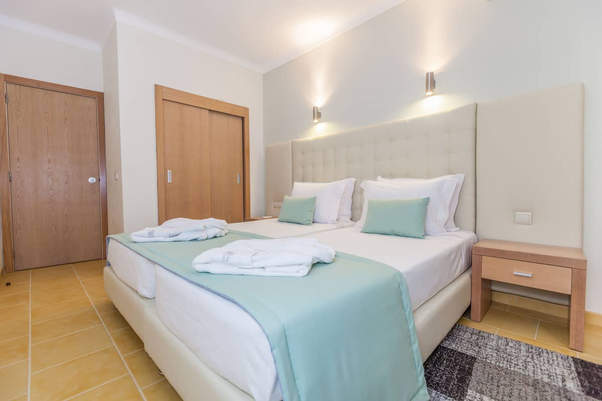 Blackout curtains, free WiFi, bed sheets