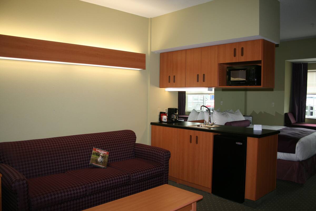 premium bedding, desk, blackout curtains, iron/ironing board