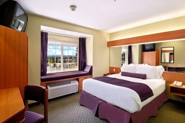 Premium bedding, desk, blackout drapes, iron/ironing board