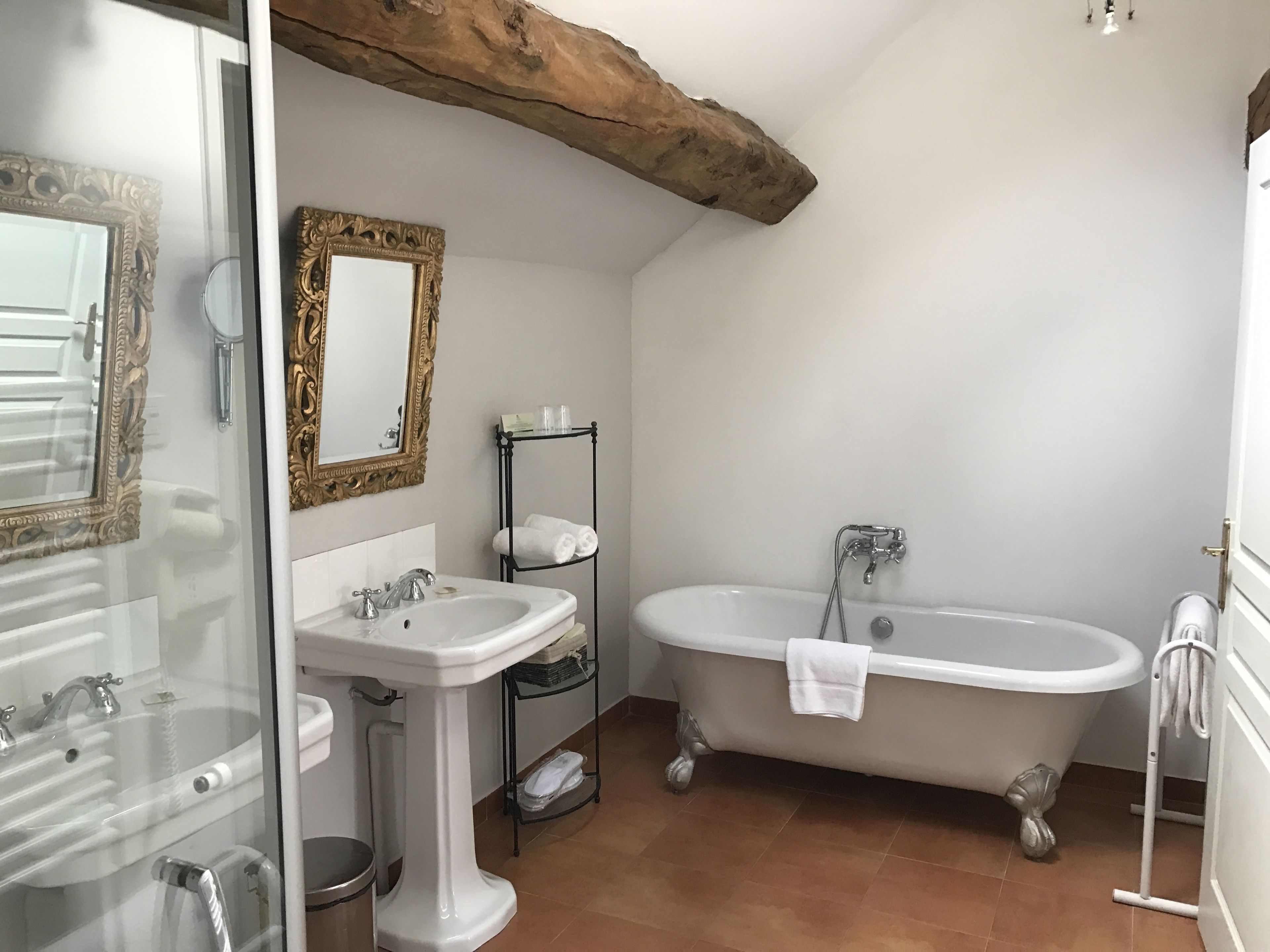 separate bathtub and shower, deep-soaking bathtub, free toiletries