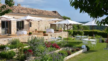 Dinner served, French cuisine, garden views