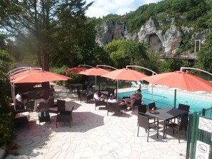 Outdoor pool, open 9:00 AM to 8:00 PM, pool loungers