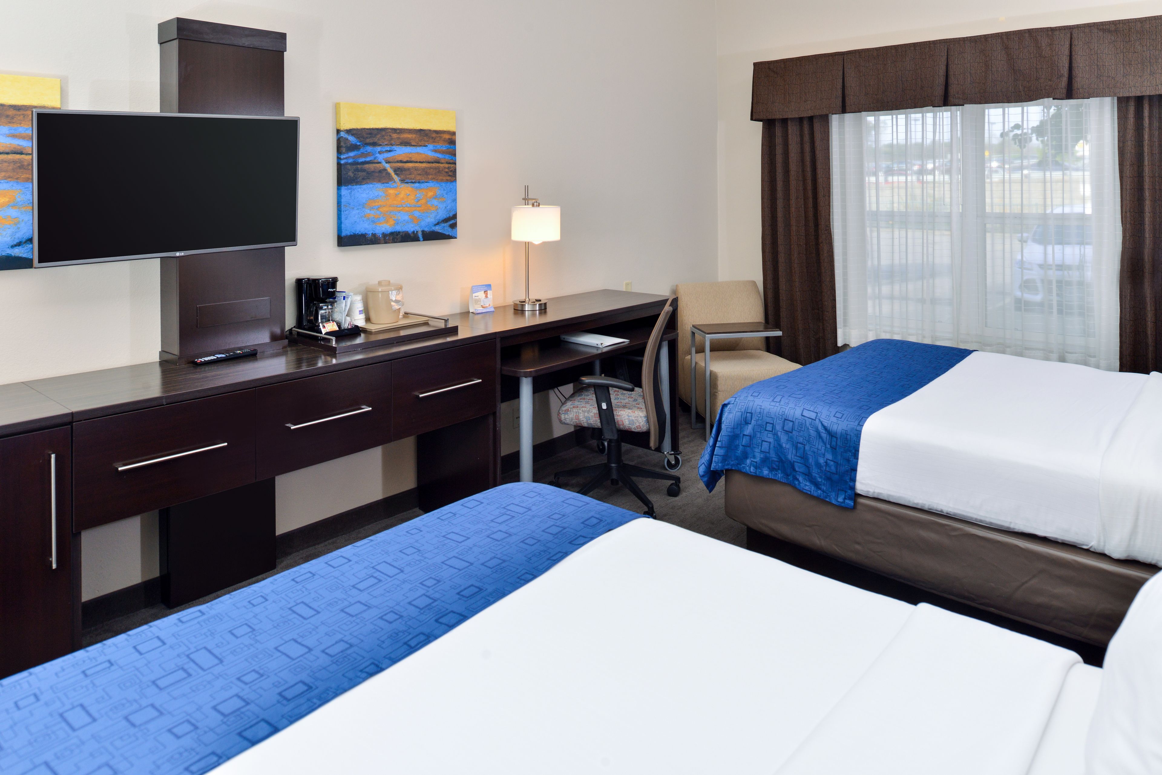 hypo-allergenic bedding, down duvets, pillow-top beds, in-room safe