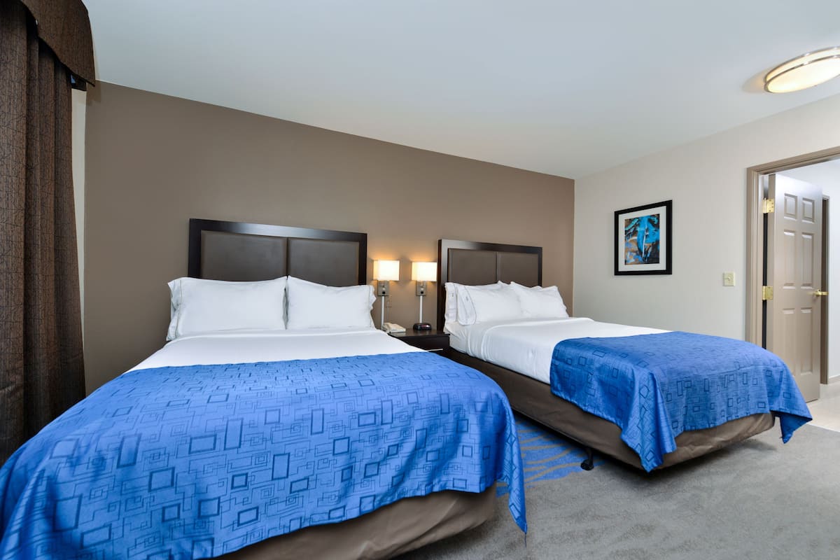 Suite, 2 Double Beds | Hypo-allergenic bedding, down comforters, pillowtop beds, in-room safe