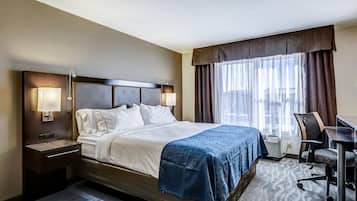 Hypo-allergenic bedding, down comforters, pillowtop beds, in-room safe