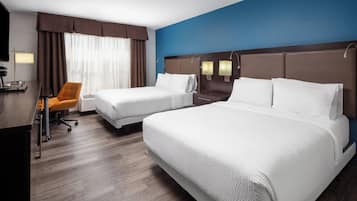 Hypo-allergenic bedding, down comforters, pillowtop beds, in-room safe