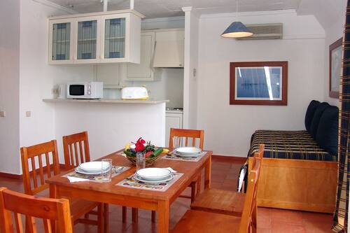 Fridge, microwave, cookware/dishes/utensils