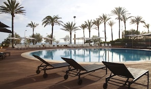 Outdoor pool, pool umbrellas, pool loungers
