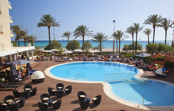 Outdoor pool, pool umbrellas, pool loungers
