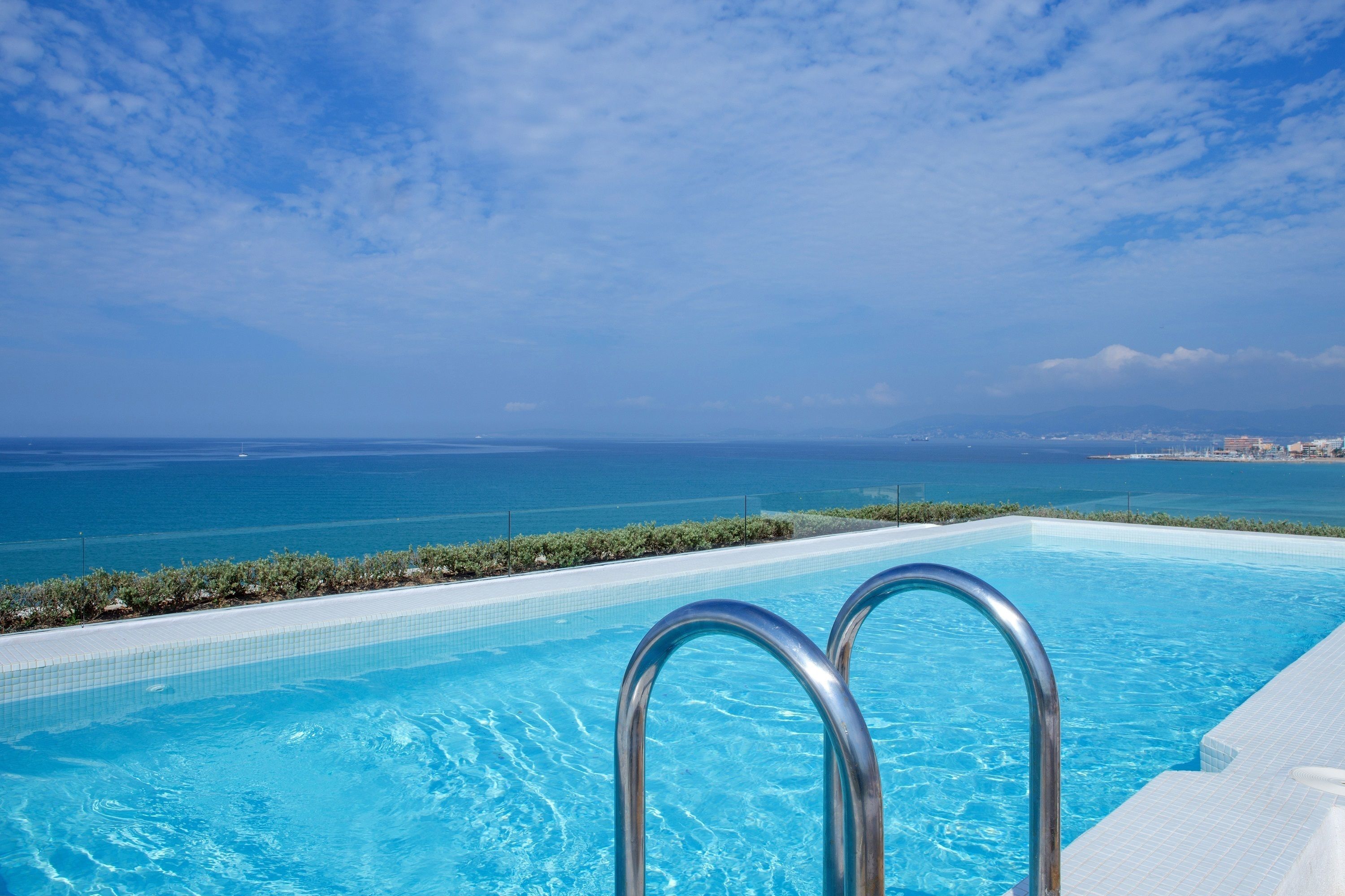 outdoor pool, pool umbrellas, pool loungers