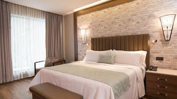 Premium bedding, in-room safe, blackout drapes, soundproofing