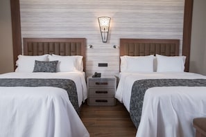 Premium bedding, in-room safe, blackout drapes, soundproofing