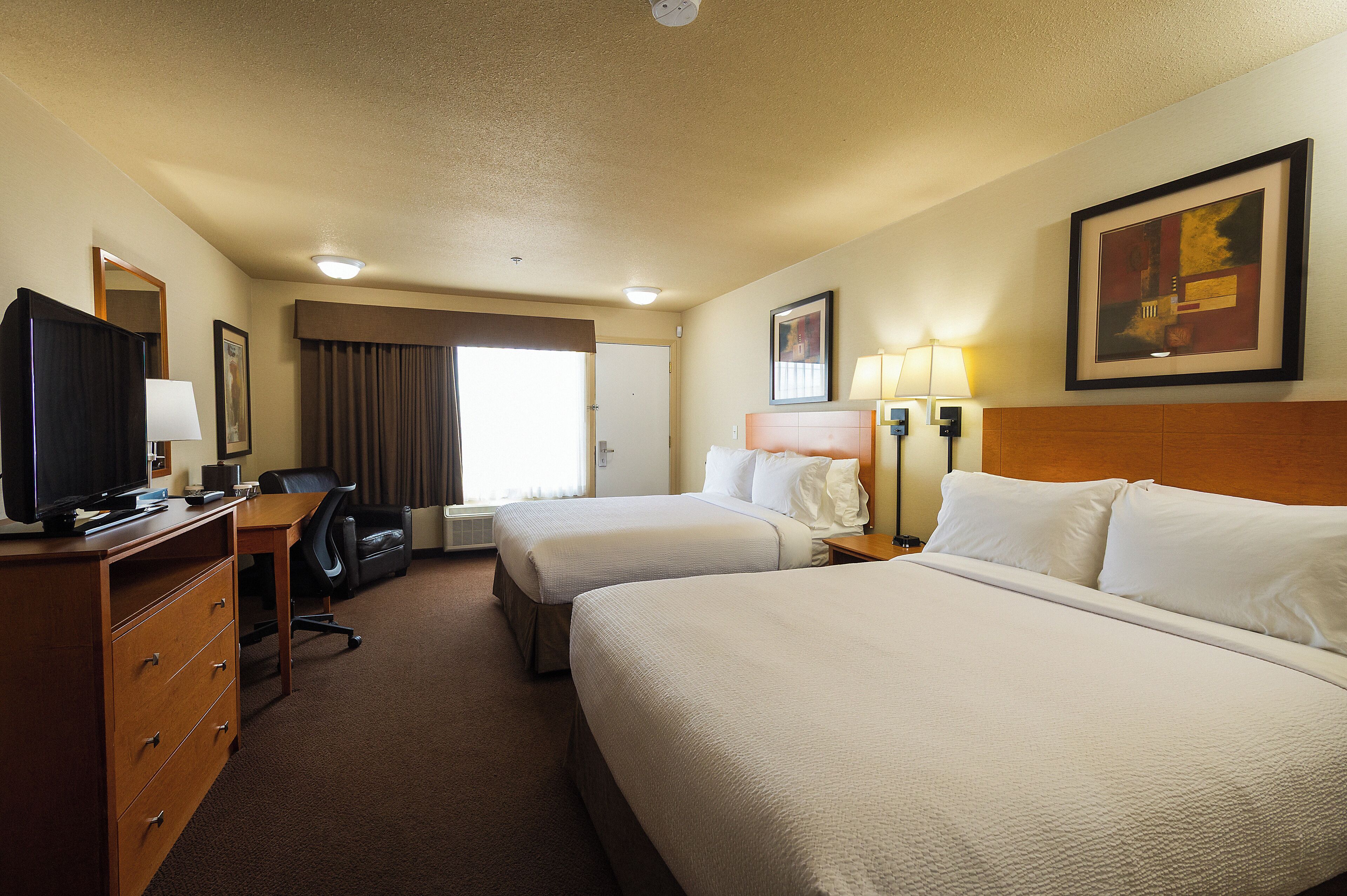 Standard Room, 2 Queen Beds, Ground Floor | Desk, blackout drapes, soundproofing, iron/ironing board