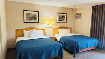 Room, 2 Queen Beds, Non Smoking, Kitchenette | Private kitchen | Coffee/tea maker, fridge, microwave, eco-friendly cleaning products
