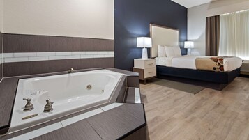 Suíte, 1 cama King, para não fumantes, banheira de imersão | Escrivaninha, espaço de trabalho para notebook