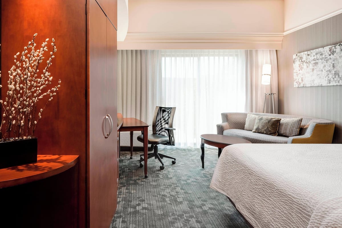 desk, blackout curtains, iron/ironing board, cots/infant beds