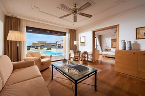 Suite (Ilis - Sharing Pool) | Living area | TV - Aldemar Olympian Village (Pyrgos)