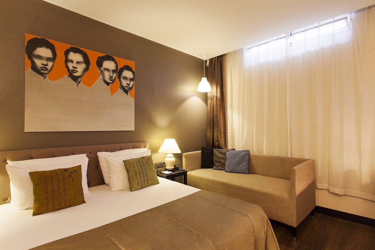 Classic Budget Double Room (in the basement) | Minibar, in-room safe, desk, blackout drapes