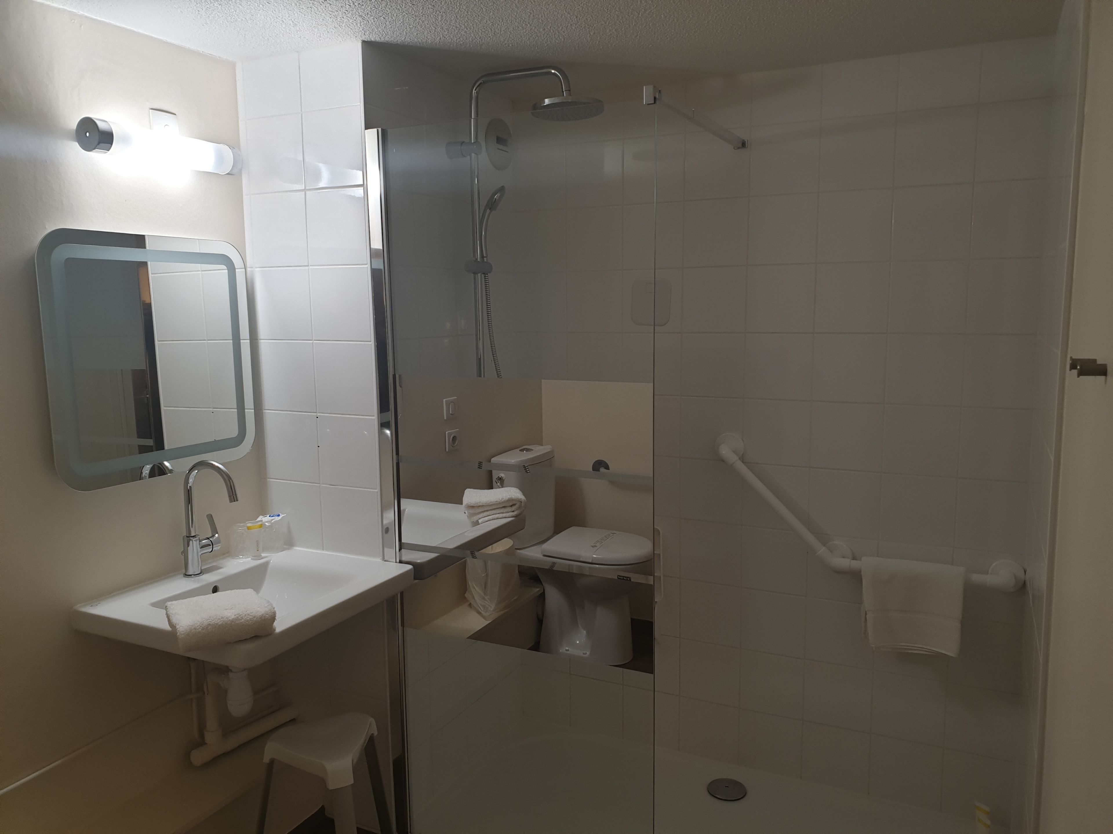 eco-friendly toiletries, hair dryer, towels, soap