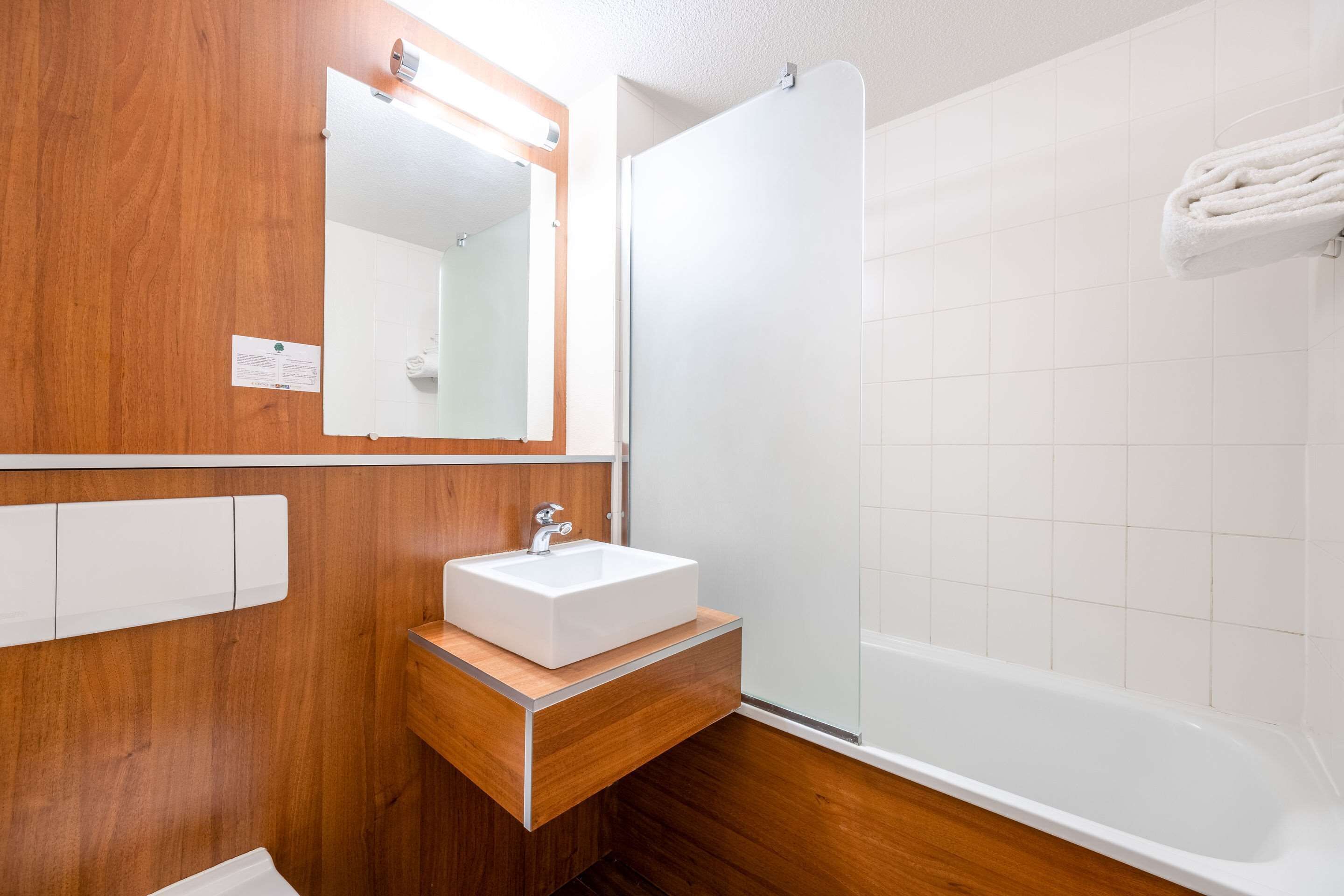 eco-friendly toiletries, hair dryer, towels, soap