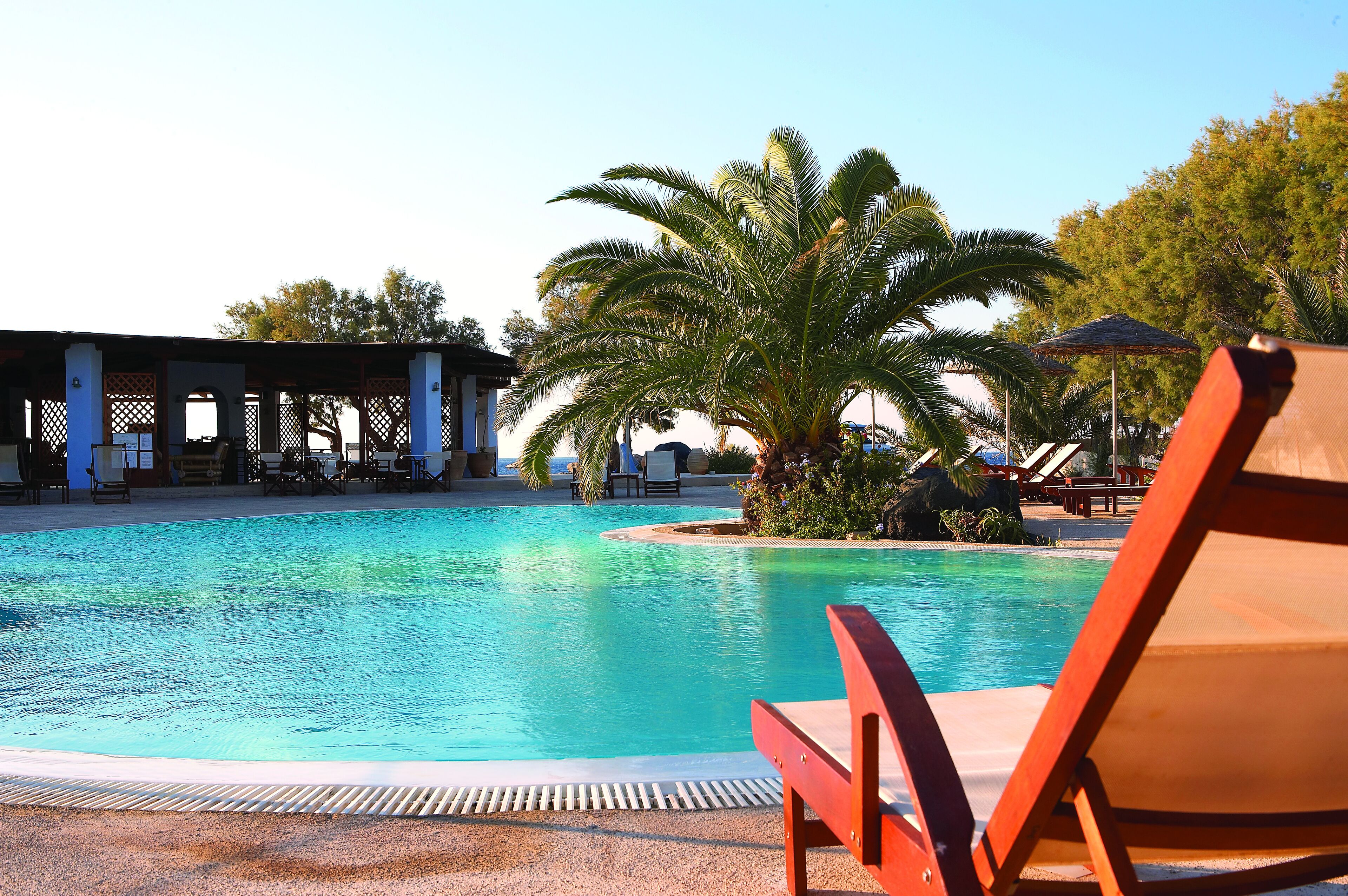 outdoor pool, pool umbrellas, pool loungers