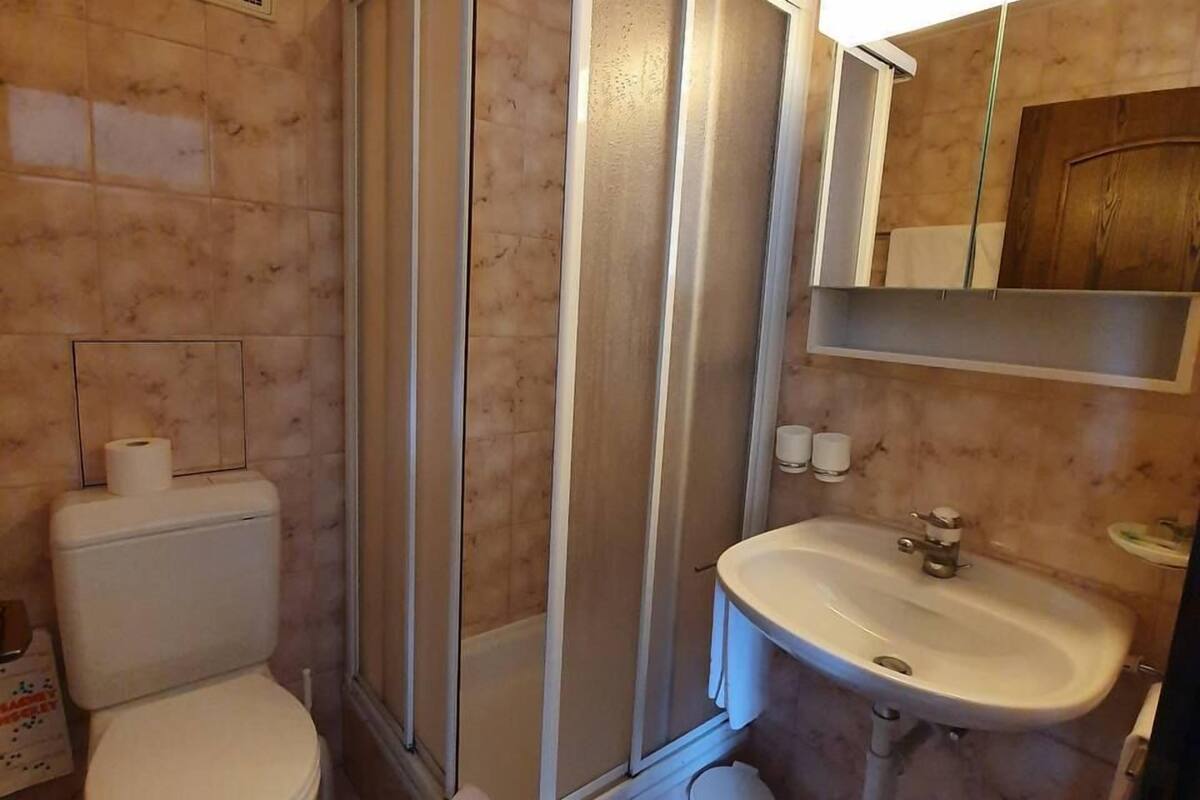 basic double room, mountain view | bathroom | shower, rainfall showerhead, hair dryer, towels