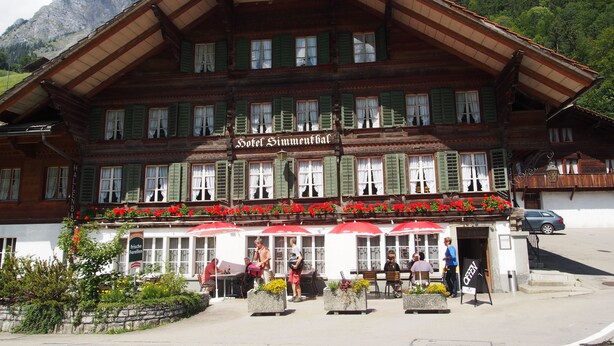 A traditional wooden building with a sign reading "Hotel Simmenthal." - Simmental (Boltigen)