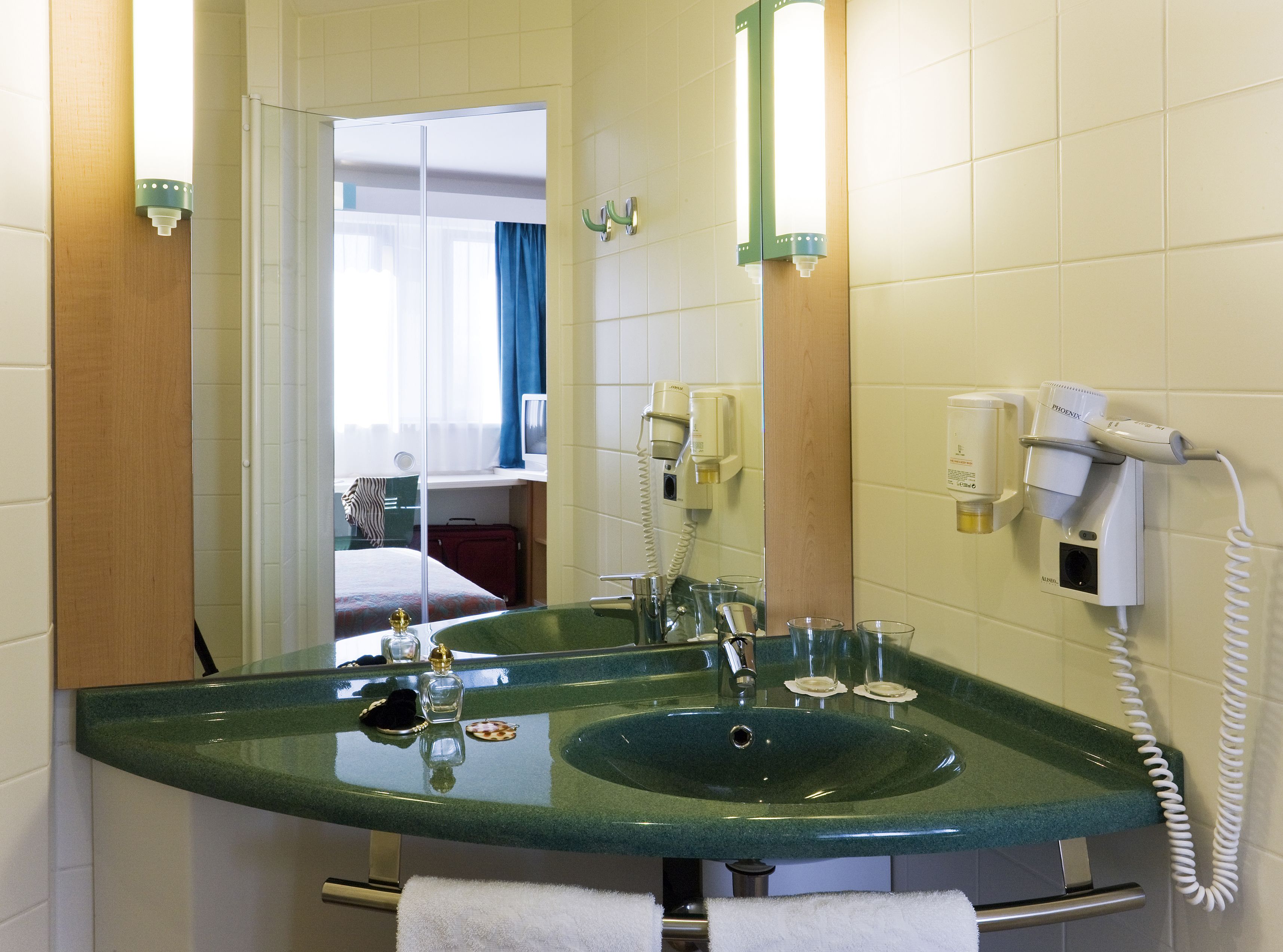 shower, eco-friendly toiletries, hair dryer, towels