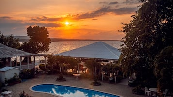 2 outdoor pools, open 8:00 AM to 10:30 PM, pool loungers