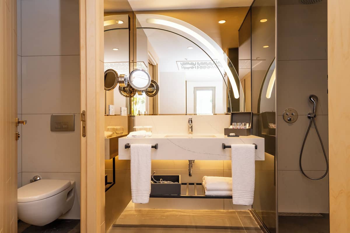 Shower, rainfall showerhead, eco-friendly toiletries, hair dryer
