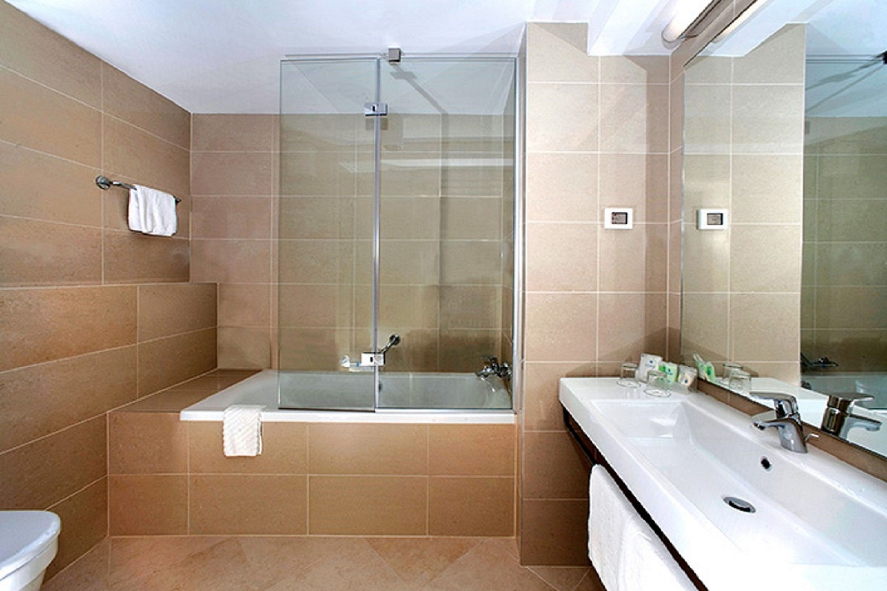 free toiletries, hair dryer, towels, toilet paper