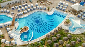 2 outdoor pools, pool umbrellas, pool loungers