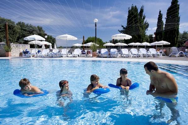 2 outdoor pools, pool umbrellas, pool loungers