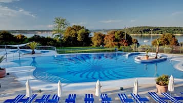 2 outdoor pools, pool umbrellas, pool loungers