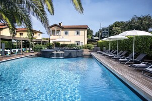 Outdoor pool, open 8:30 AM to 7 PM, sun loungers