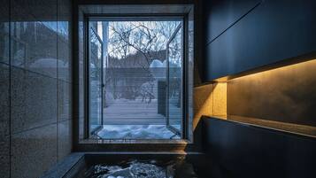 Japanese-Western Suite with Semi-Open-Air Onsen | Bathroom | Separate tub and shower, spring water tub, free toiletries, hair dryer