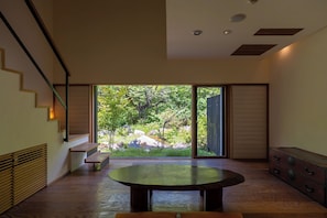 Superior Villa, Hot Tub, River View | Free minibar, in-room safe, individually decorated